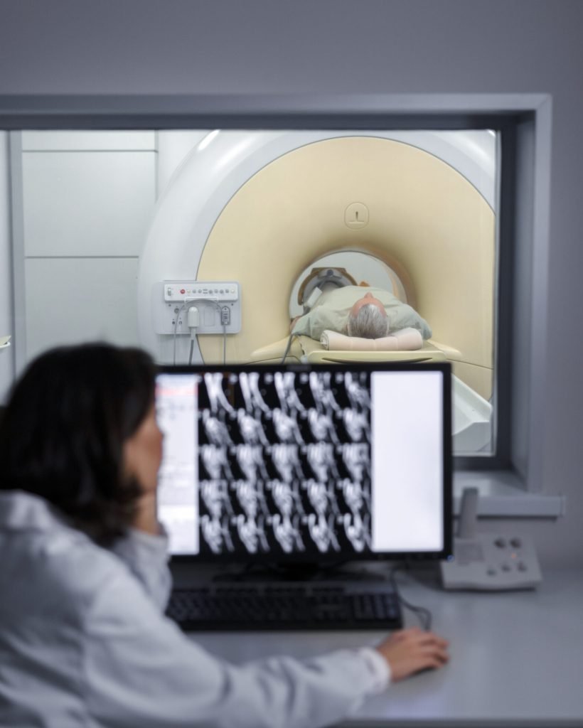 doctor-looking-ct-scan doctor-looking-ct-scan